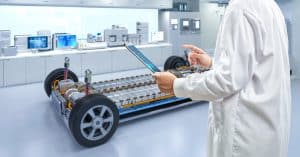 Asian,Engineer,Or,Technician,Work,With,Ev,Car,Battery,Cells