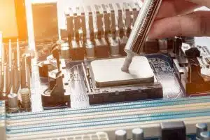 close up of Silicone CPU or Thermal Compound on Mainboard Electronic computer.